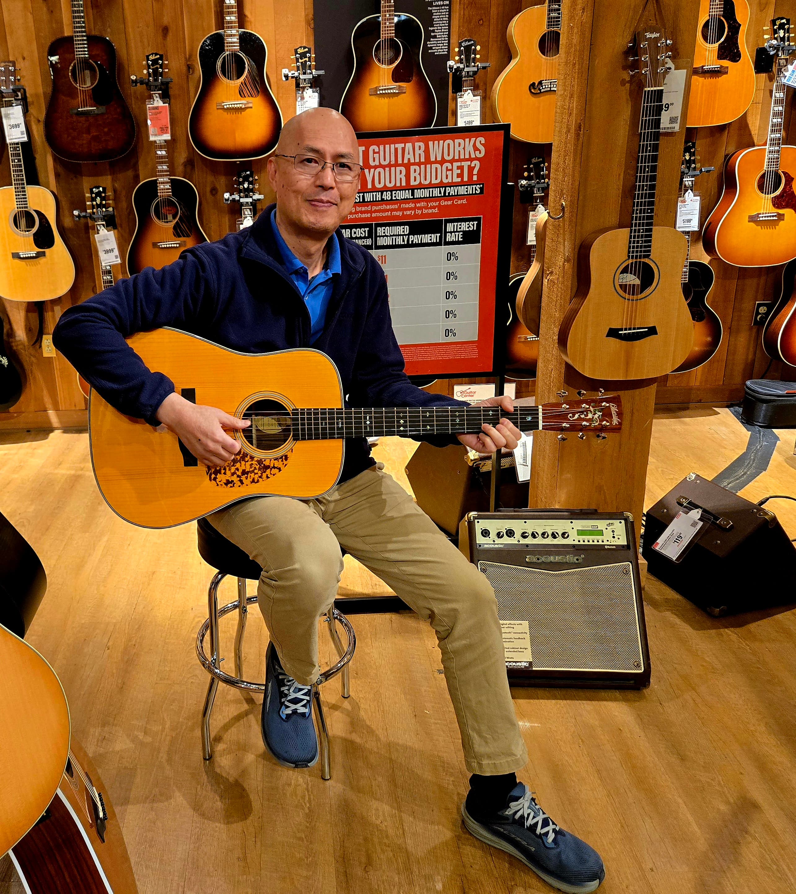 Chim playing acoustic guitar